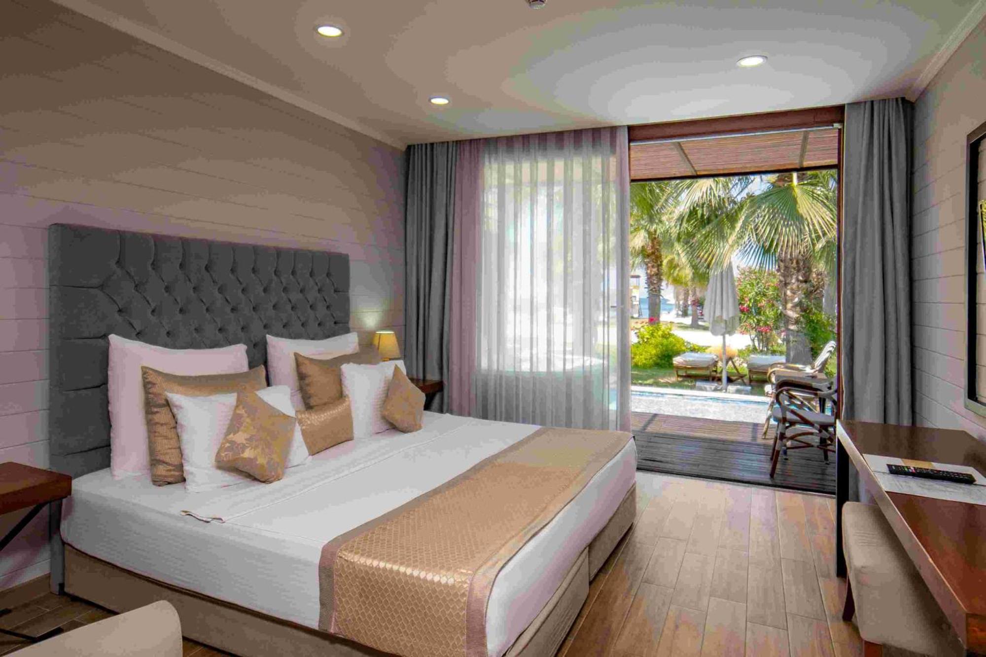Risus Beach Resort Hotel Кушадасы Экстерьер фото