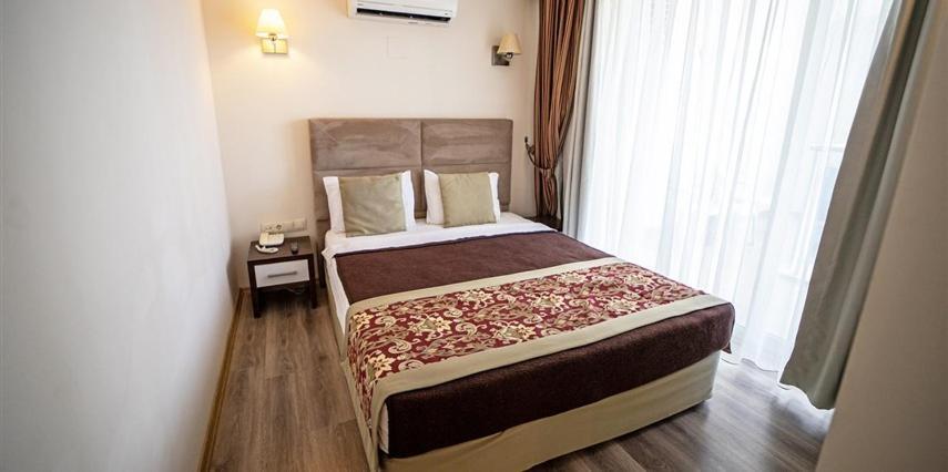 Risus Beach Resort Hotel Кушадасы Экстерьер фото